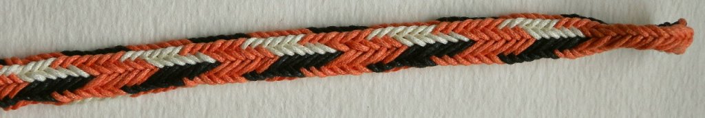 fingerloop braiding, 2-worker finger loop braid, waxed cotton, made by Ingrid Crickmore, solo braider.