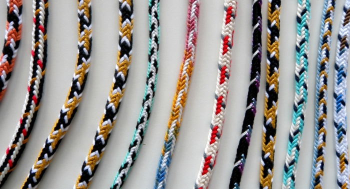 Unorthodox 7-loop fingerloop braids, by Ingrid Crickmore